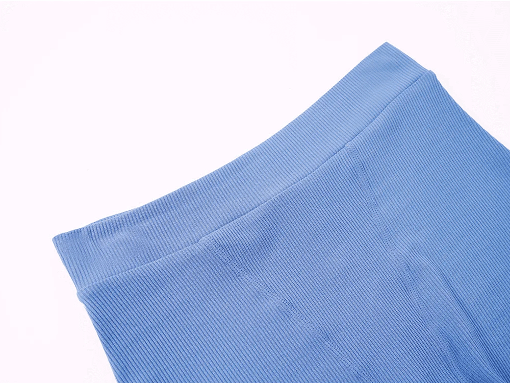 Blue women's yoga and fitness shorts with ribbed texture, perfect for running, dance, or casual wear. Soft, stretchy cotton-spandex blend.